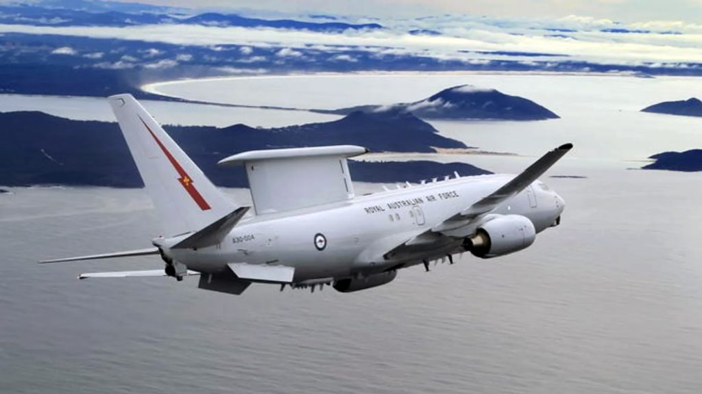 Royal Australian Air Force plane flying above water